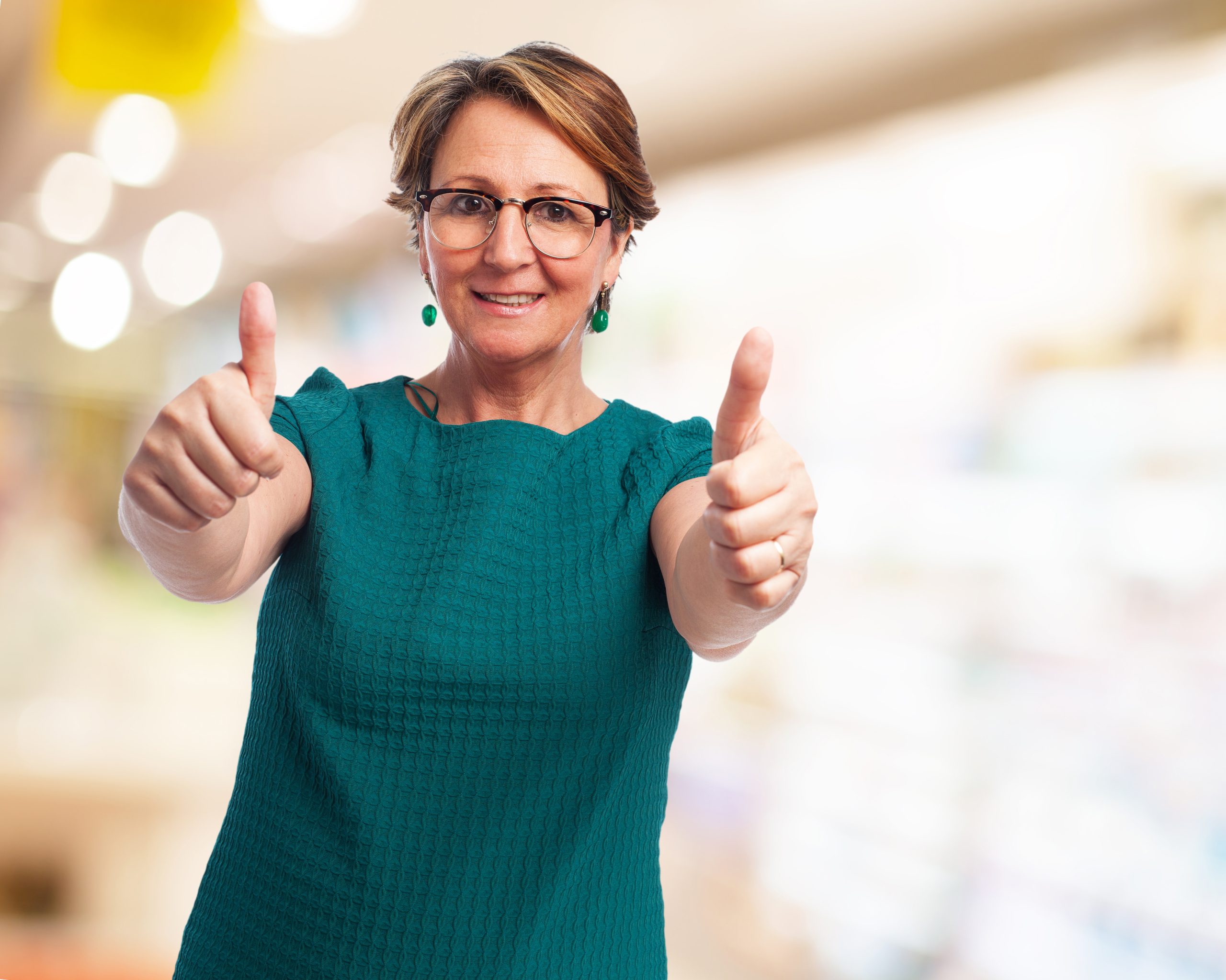 woman with thumbs up scaled